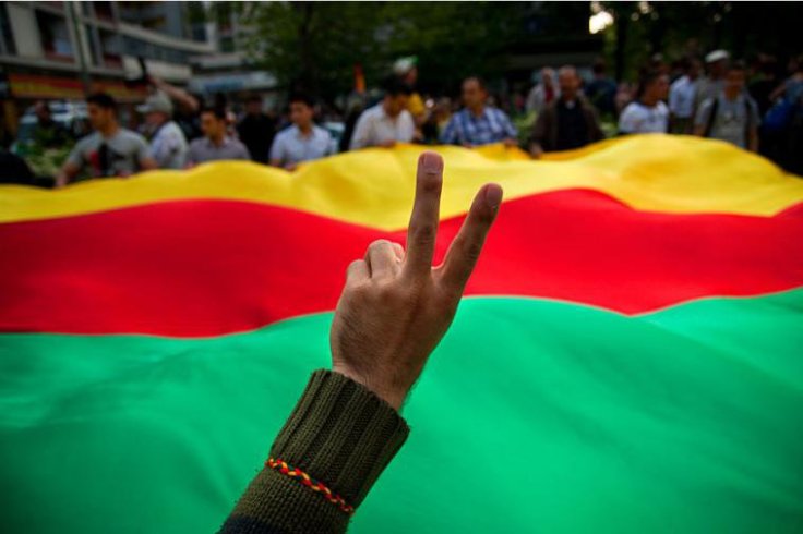44474e130534fdd3aa797f1f605c572d5b8a3de7-rojava-flag
